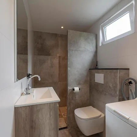 Family Near Dunes And Sint Maartensvlotbrug