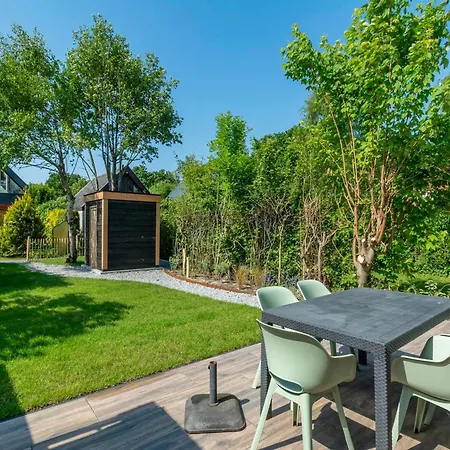 Family Near Dunes And Sint Maartensvlotbrug
